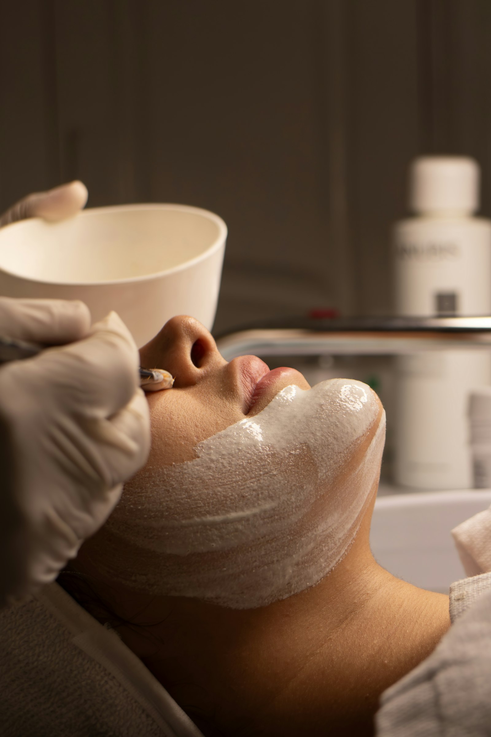 A client receiving a facial treatment